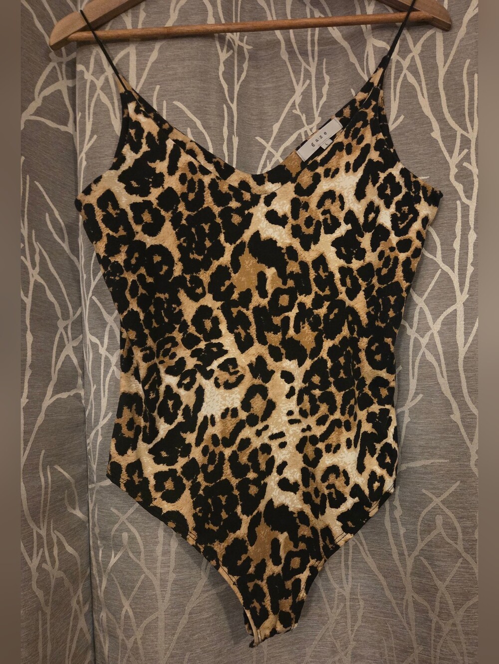 gaze Leopard Print One-Piece Bodysuit in Tan and Black. Size L